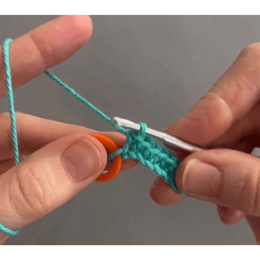 image showing how to crochet your first row using a stitch marker